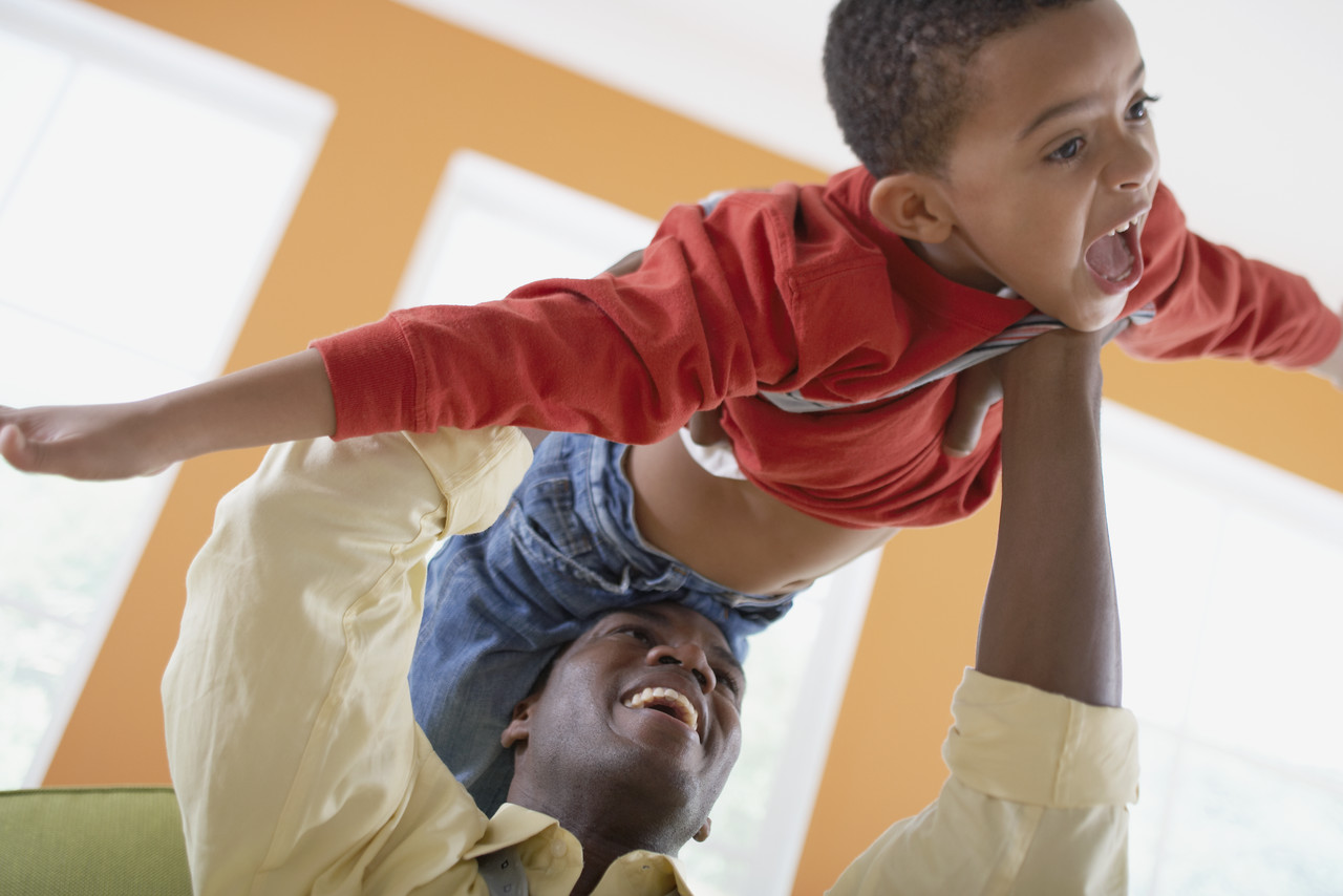 Young Boy Pretending to Fly